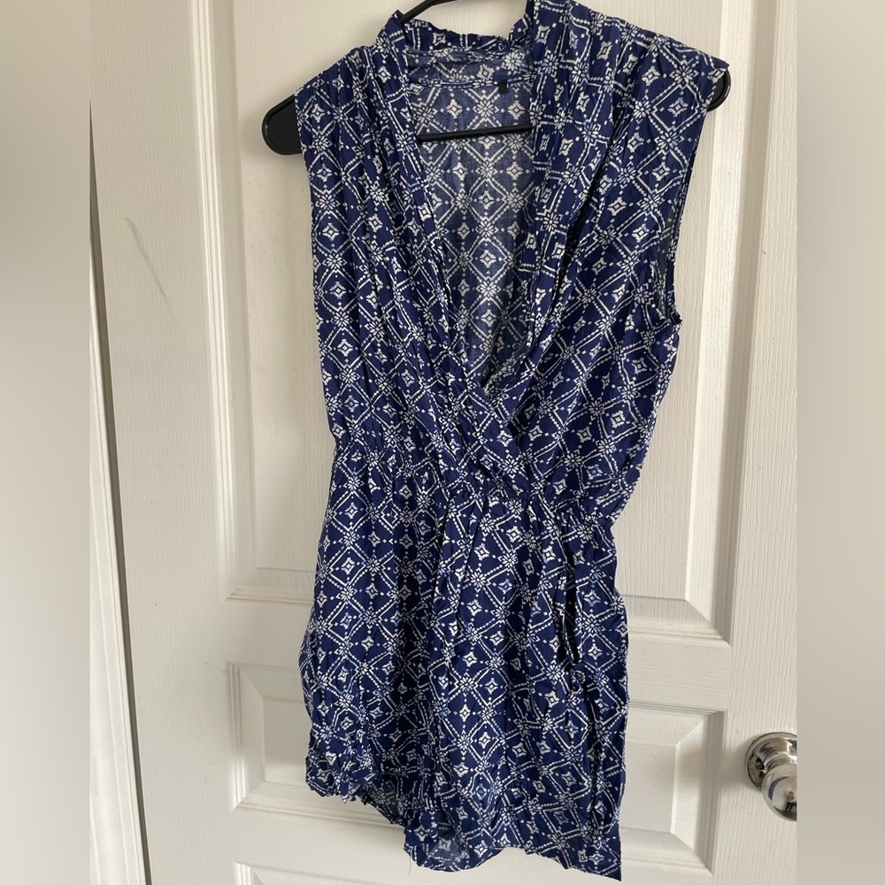 Blue printed short sleeve romper with deep v neck cut